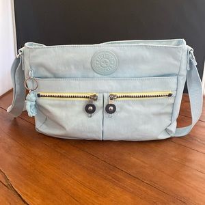 Kipling Angie  lightweight, crossbody is packed with pockets NWT light blue